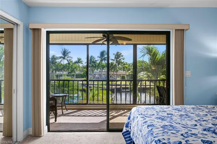 Primary bedroom has a view of the canal