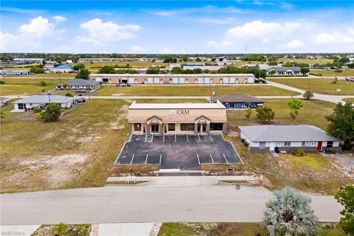 Additional lot included with the sale, creating endless possibilities for future growth and business expansion.