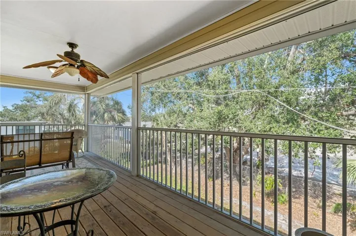 Wooden deck with ceiling fan