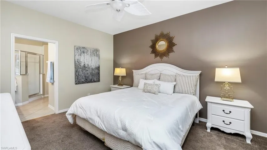 Bedroom with carpet flooring and a ceiling fan