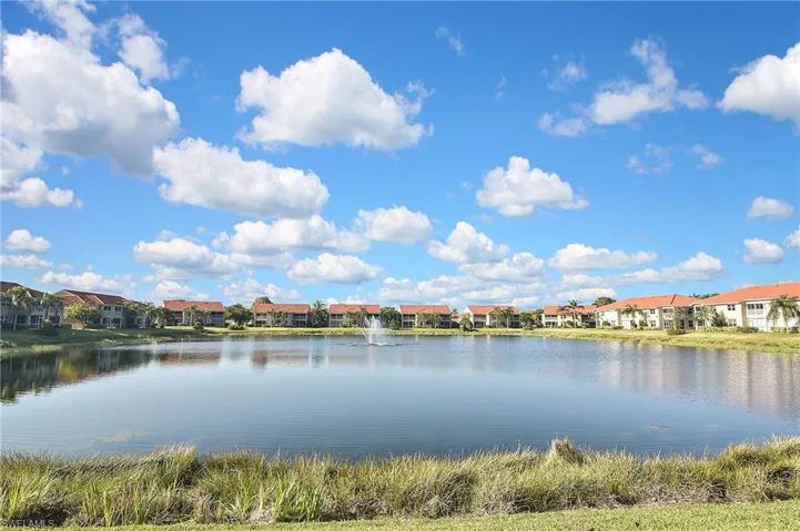 Property view of water with a residential view