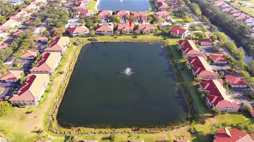 Aerial view with a water view and a residential view