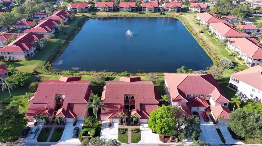 Aerial view with a residential view and a water view