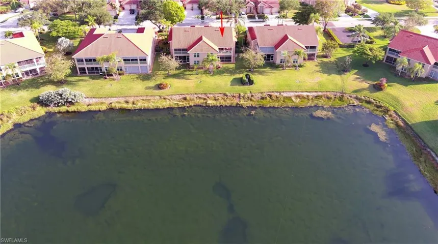 Aerial view with a residential view and a water view