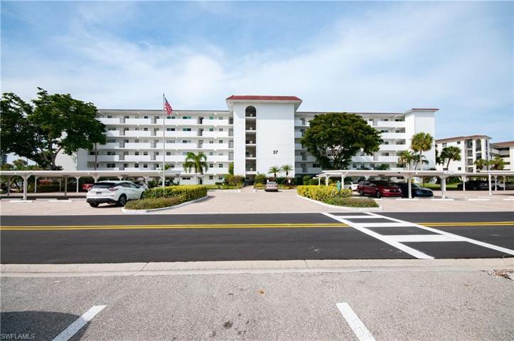 On the 4th floor, one covered parking, plus guest parking, newly paved road.