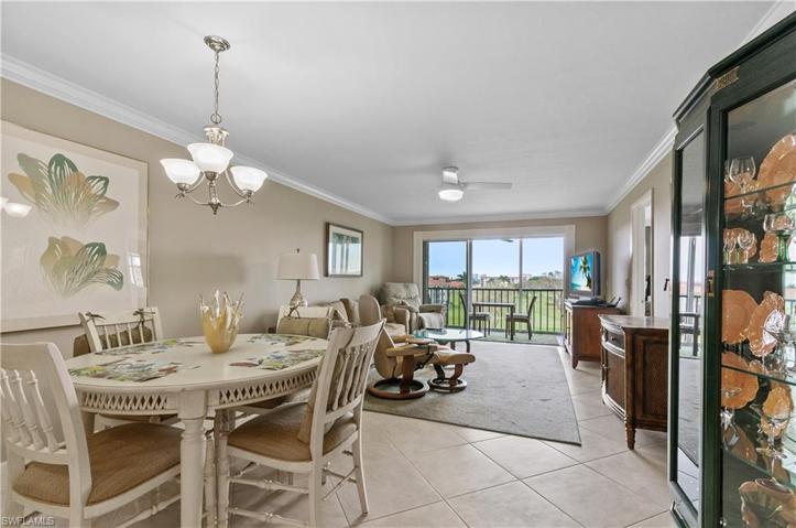 Tile on the diagonal, crown molding, newer light fixtures and fans.