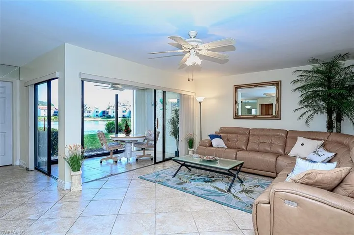 Reclining leather sectional, tiled living room
