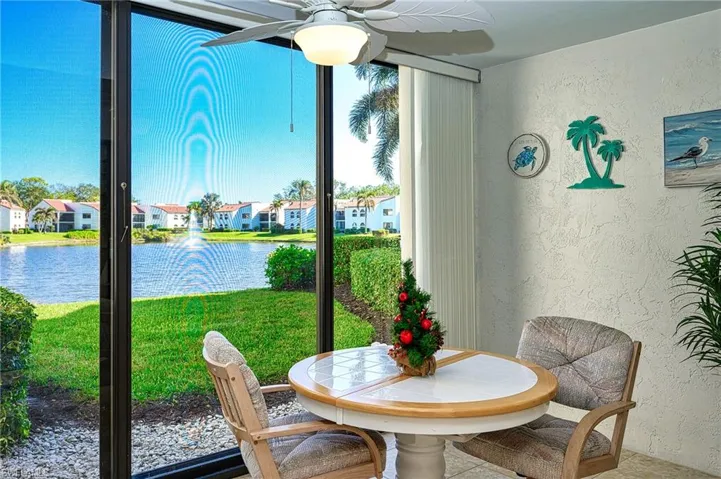 Glass & screened sliders  lanai with expansive lake views