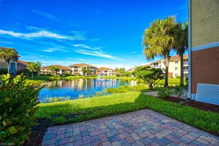 View of patio / terrace with a water view