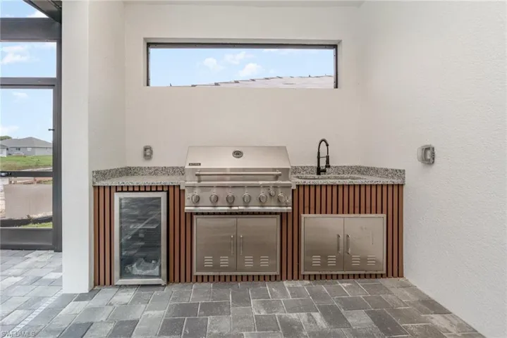 Bar with plenty of natural light and sink