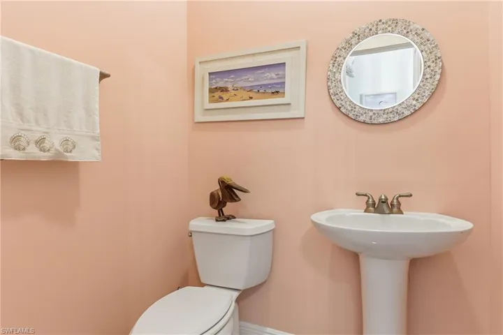 Half bath featuring toilet