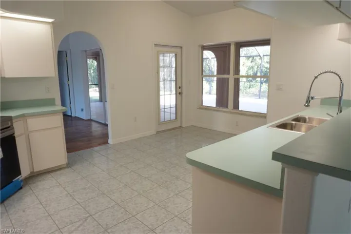 Kitchen has a breakfast nook and lanai access