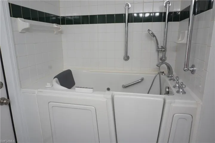 Guest bathroom with newer walk-in jetted tub