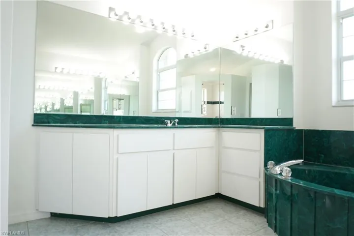 Primary bath with split vanities