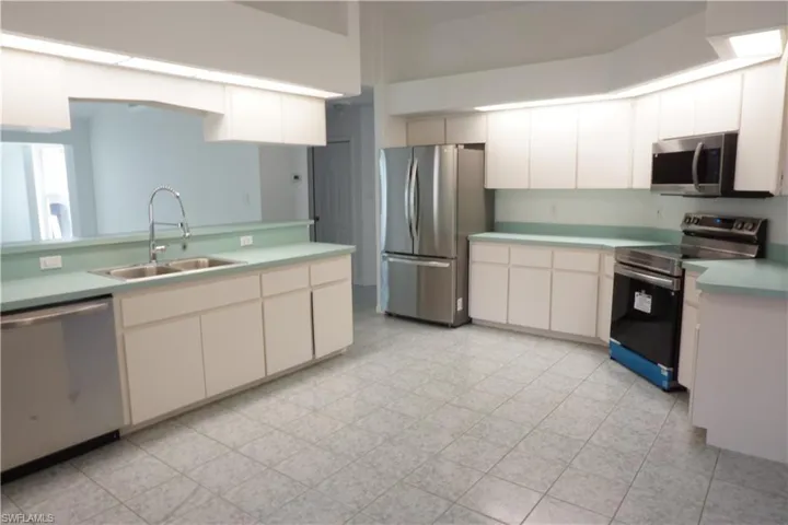 Kitchen with new stainless steel appliances