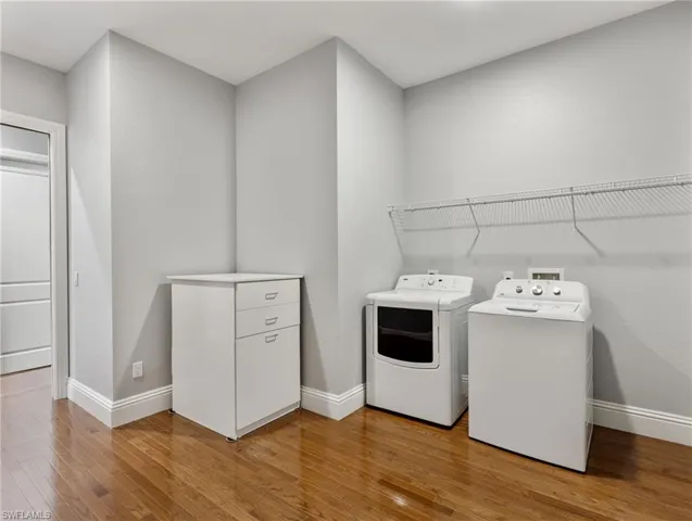 Master closet 1 with washer and dryer.