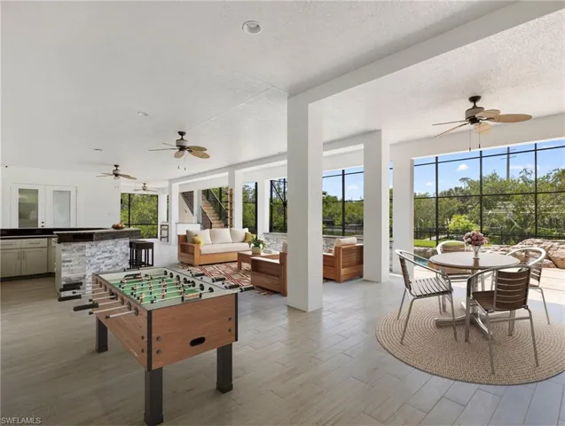 Outdoor living area lanai. Virtually staged.