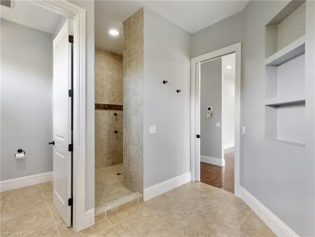 Master shower with multiple shower heads.