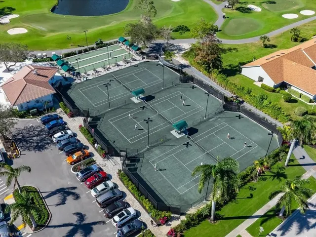 Tennis courts with bocce courts and half-way house to the left.  Grab a quick snack when you are on the go.