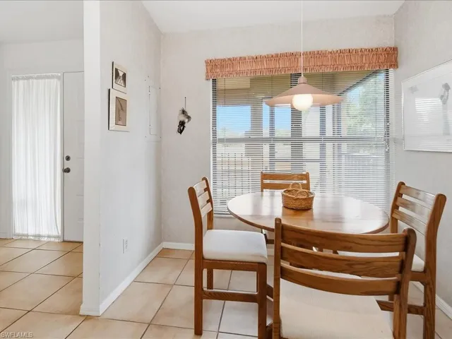 Eat-in kitchen looks out onto the front lanai.