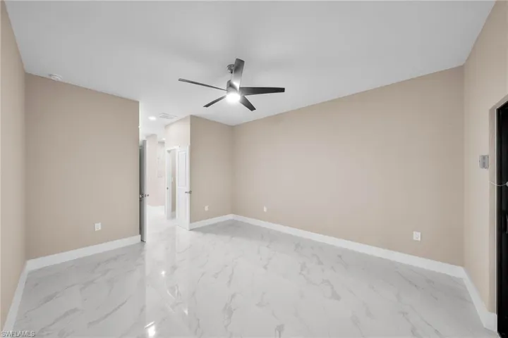 Spare room featuring ceiling fan