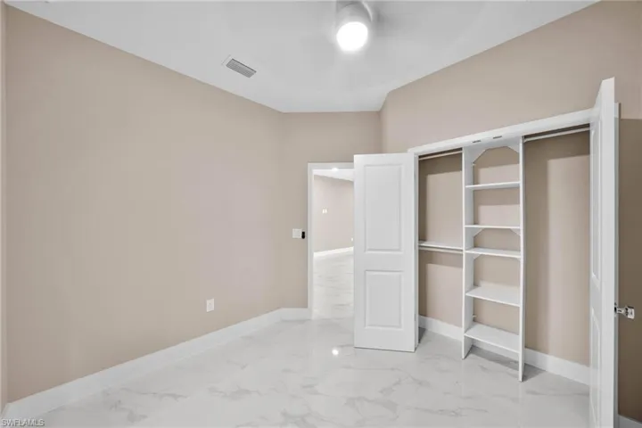 Unfurnished bedroom featuring a closet