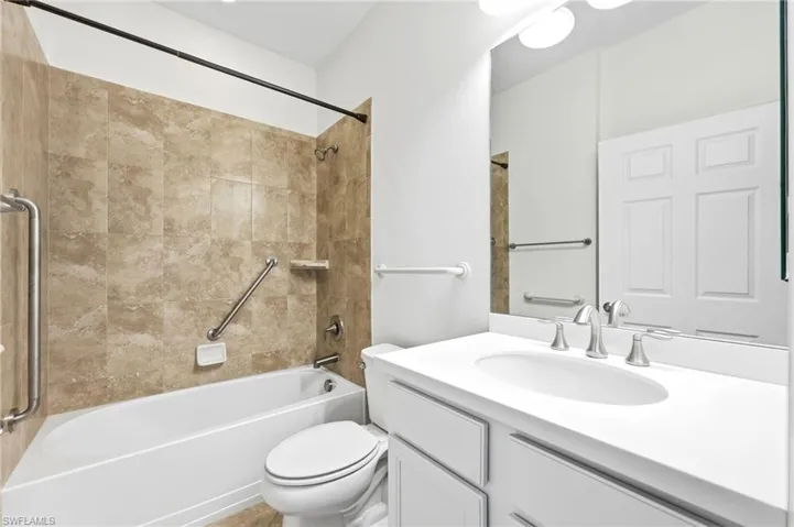 Full bathroom featuring vanity and shower / bathtub combination