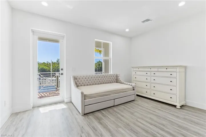 Sitting room featuring recessed lighting and light wood-style floors