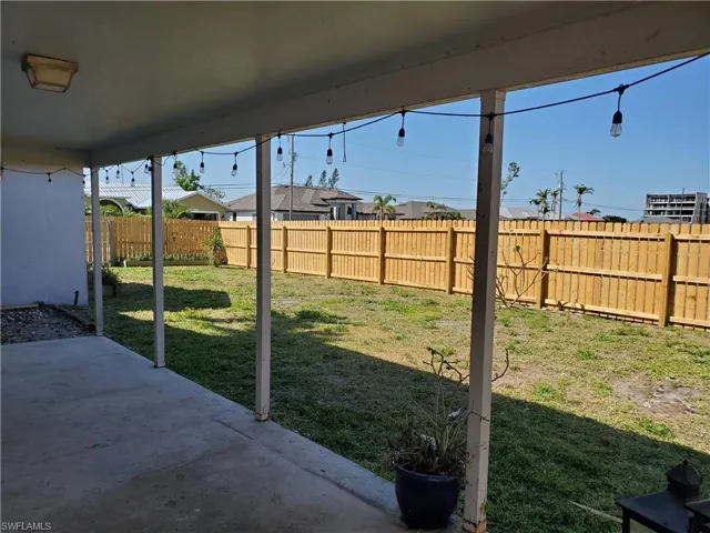 Large FENCED yard that wraps around house on both sides