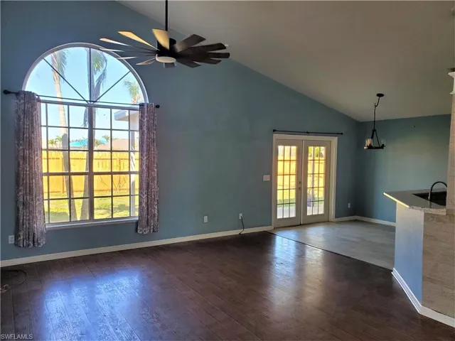 Great room with beautiful arched window