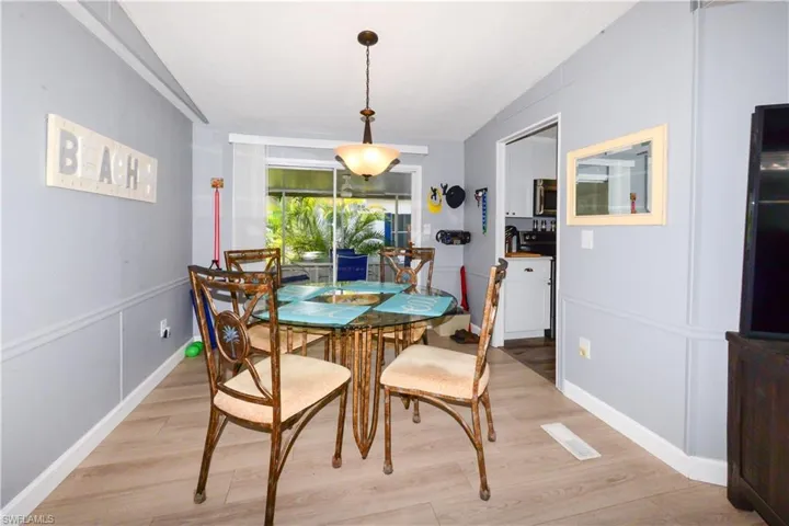 Dining area featuring light wood finished floors