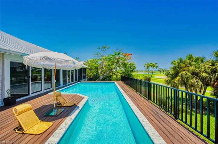 View of pool with a deck
