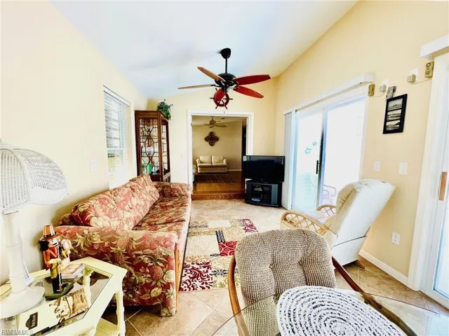 Addition with sliding doors leading to courtyard and pool.