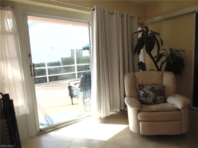 Sitting room featuring tile patterned flooring