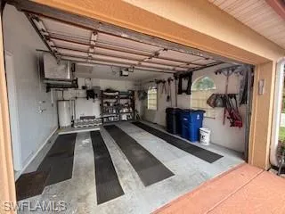 Garage featuring water heater
