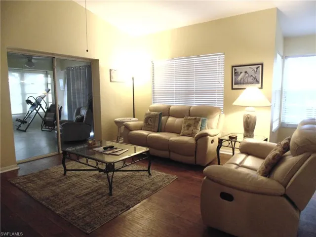 Living room featuring hardwood / wood-style flooring