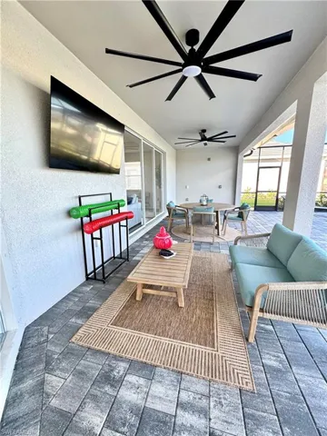 outdoor seating, fans and pool floats