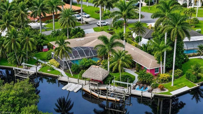 This magnificent home offers privacy and the complete outdoor and waterfront lifestyle.