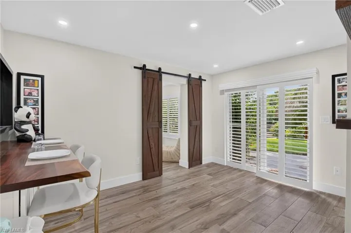 Dining area  / flex room in guest quarters with slider to outdoor area.