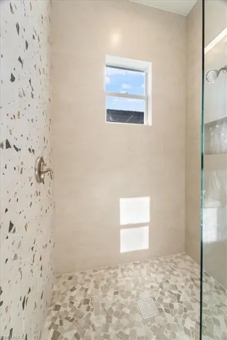 Full bath with tiled shower
