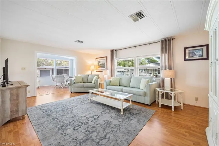 Living room featuring light wood-style floors