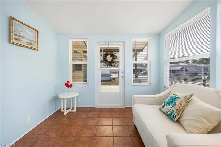 Living area with tile patterned flooring