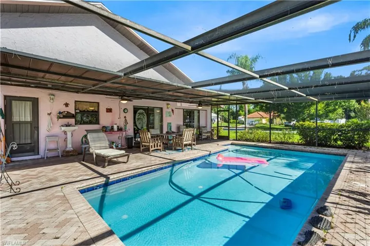 View of pool featuring a lanai and a patio