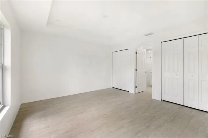 Unfurnished bedroom featuring light hardwood / wood-style floors