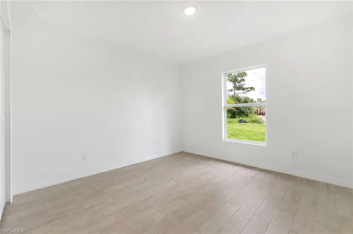 Empty room featuring light hardwood / wood-style floors