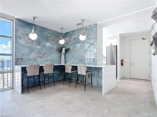 Social room on amenities floor, equipped with kitchen for residents use and events