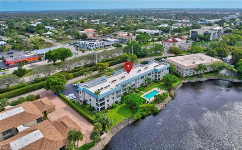 Aerial overview of property's location with apartment complex