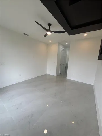 Spare room featuring ceiling fan