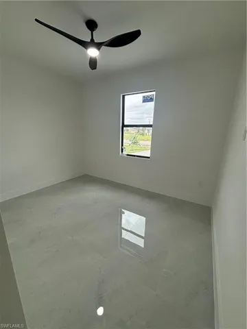Unfurnished room with ceiling fan