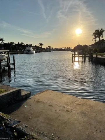 Water view featuring a dock